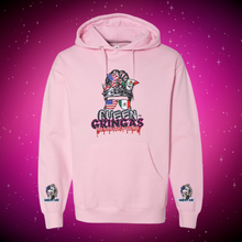 Light pink hoodie featuring Queen Gringa graphic with American and Mexican flag bandana, graffiti-style dripping logo, and sleeve prints for Wash N’ Dry and Queen Gringa branding.