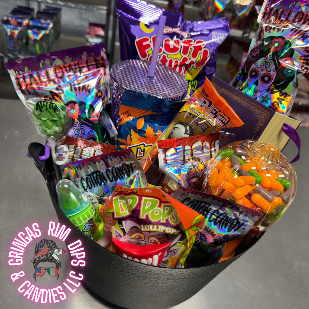 Halloween candy surprise buckets and totes filled with assorted spooky-themed candies, cotton candy, and mystery treats.