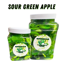 Two jars of Gringas Sour Green Apple gummy candies on a white background